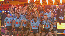 NSW Blues celebrate with the shield.