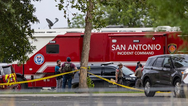 Equipment from the San Antonio Fire Department is parked outside Robb Elementary School in Uvalde, Texas.
