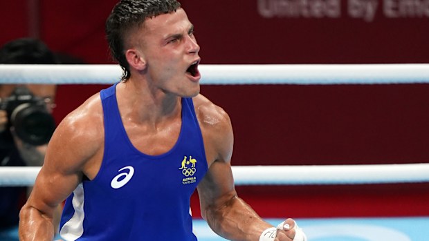 Australia's Harry Garside celebrates his victory over Kazakhstan's Zakir Safiullin.