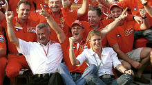 Michael Schumacher celebrates with his wife Corrina team boss Jean Todt, Manager Willi Weber, and Rubens Barrichello after clinching the World Championship with his win in Hungary  (Photo by Steve Mitchell/EMPICS via Getty Images)