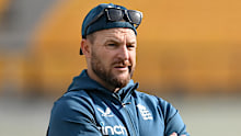DHARAMSALA, INDIA - MARCH 05: England coach Brendon McCullum and captain Ben Stokes during a nets session at Himachal Pradesh Cricket Association Stadium on March 05, 2024 in Dharamsala, India. (Photo by Gareth Copley/Getty Images)