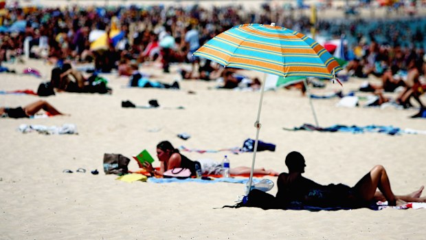 Tourists flock to a crowded Bondi beach