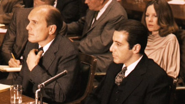Robert Duvall as Tom Hagen and Al Pacino as Don Michael Corleone.  