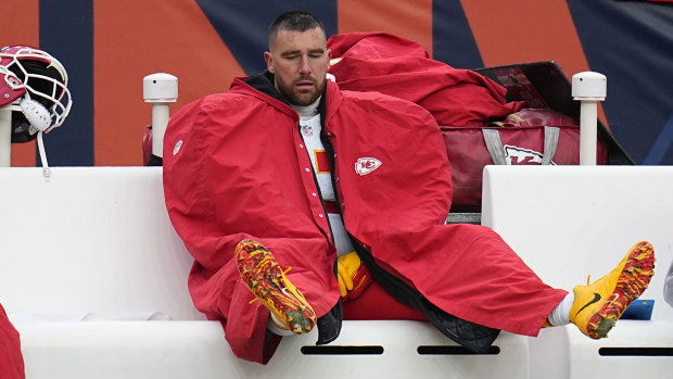 Kansas City Chiefs tight end Travis Kelce sits on the bench during the second half of an NFL football game against the Denver Broncos Sunday, Oct. 29, 2023, in Denver. (AP Photo/Jack Dempsey)