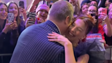 The co-stars shared a sweet embrace on the red carpet.