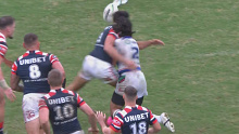 Joseph Suaalii tackles Dallin Watene-Zelezniak. 
