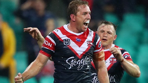 Mitch Aubusson of the Roosters celebrates scoring a try during the round one NRL match between the Sydney Roosters and the South Sydney Rabbitohs at Sydney Cricket Ground on March 15, 2019 in Sydney, Australia. (Photo by Cameron Spencer/Getty Images)