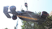 Hamilton's car was craned away after he crashed late in practice.