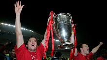 Liverpool's Harry Kewell celebrates with the Champions League trophy in 2005.