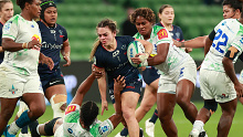 Jayme Nuku of the Rebels runs with the ball during the round five Super Rugby Women's match between Melbourne Rebels and Fijian Drua.
