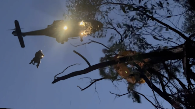 The paraglider was rescued last night after becoming stuck on Monday afternoon. 