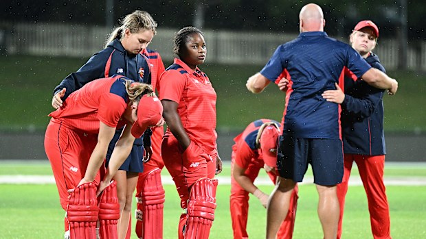 Scorpions players look dejected after the loss during the WNCL Final match between Tasmania and South Australia at Blundstone Arena, on February 25, 2023, in Hobart, Australia. (Photo by Steve Bell/Getty Images)