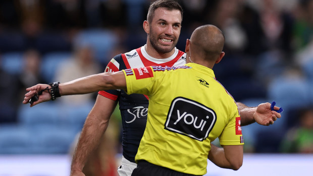 James Tedesco of the Roosters speaks with the referee.