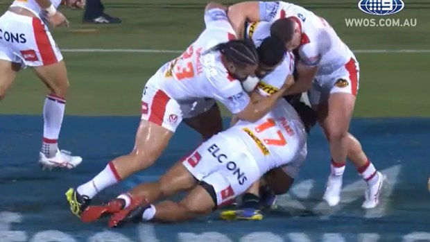 Agnatius Paasi tackles Penrith winger Taylan May during the World Club Challenge.