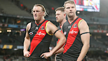 Mason Redman and Jake Stringer of the Bombers look dejected after a loss.