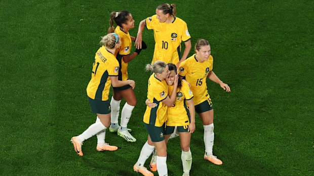 Hayley Raso celebrates with teammates after scoring the Matildas' second goal during the FIFA Women's World Cup Australia & New Zealand 2023 round of 16 match between Australia and Denmark at Stadium Australia.