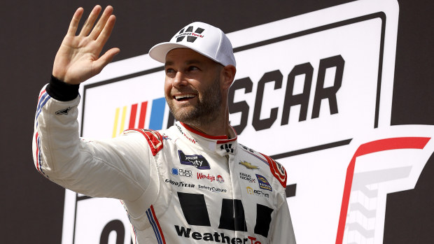 Shane Van Gisbergen, driver of the #97 WeatherTech Chevrolet, waves to fans as he walks onstage during driver intros prior to the NASCAR Xfinity Series Focused Health 250 at Circuit of The Americas on March 23, 2024 in Austin, Texas. (Photo by Sean Gardner/Getty Images)