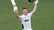 Cameron Bancroft celebrates his hundred. 