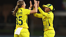 GQEBERHA, SOUTH AFRICA - FEBRUARY 14: Georgia Wareham of Australia celebrates the wicket of Sobhana Mostary of Bangladesh with team mate Alana King during the ICC Women's T20 World Cup group A match between Australia and Bangladesh at St George's Park on February 14, 2023 in Gqeberha, South Africa. (Photo by Matthew Lewis-ICC/ICC via Getty Images)