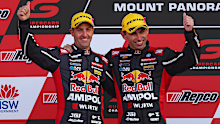 Jamie Whincup and Broc Feeney, drivers of the Triple Eight Race Engineering Chevrolet Camaro celebrate finishing in second place following the Bathurst 1000.