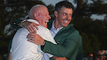Rory McIlroy celebrates with his father.