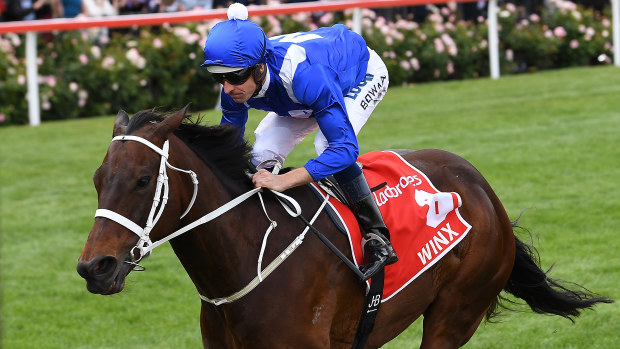 Hugh Bowman rides Winx to victory.