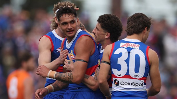 BALLARAT, AUSTRALIA - AUGUST 25: Jamarra Ugle-Hagan of the Bulldogs is congratulated by w21during the round 24 AFL match between Western Bulldogs and Greater Western Sydney Giants at Mars Stadium, on August 25, 2024, in Ballarat, Australia. (Photo by Daniel Pockett/Getty Images)