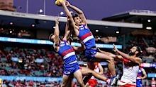 Bulldogs star Sam Darcy leaps for a mark against the Swans.