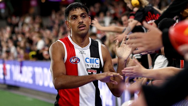 MELBOURNE, AUSTRALIA - MARCH 29: Nasiah Wanganeen-Milera of the Saints enjoys the win with fans during the round three AFL match between St Kilda Saints and Richmond Tigers at Marvel Stadium, on March 29, 2025, in Melbourne, Australia. (Photo by Jonathan DiMaggio/Getty Images)