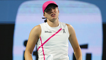 Iga Swiatek reacts during her women's singles match against Ekaterina Alexandrova at the Miami Open.