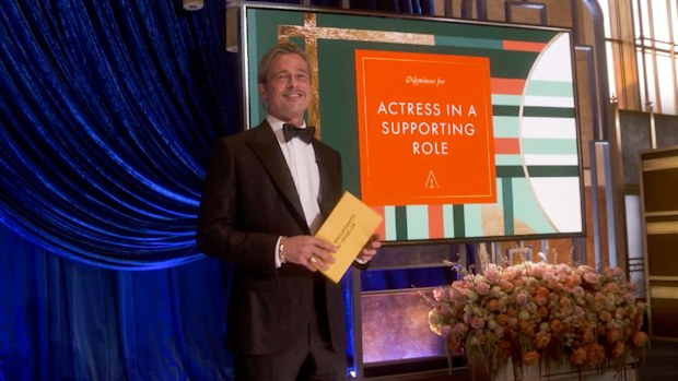 Brad Pitt presents at the 2021 Oscars