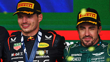 Three-time F1 champion Max Verstappen (left) with two-time champ Fernando Alonso.