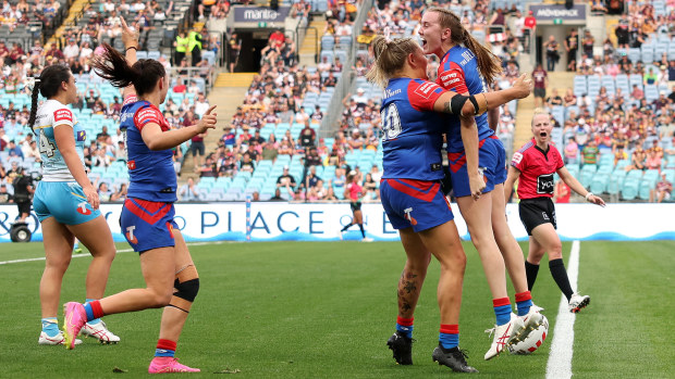 Tamika Upton of the Knights celebrates with team mates after scoring a try during the 2023 NRLW Grand Final match between Newcastle Knights and Gold Coast Titans at Accor Stadium.