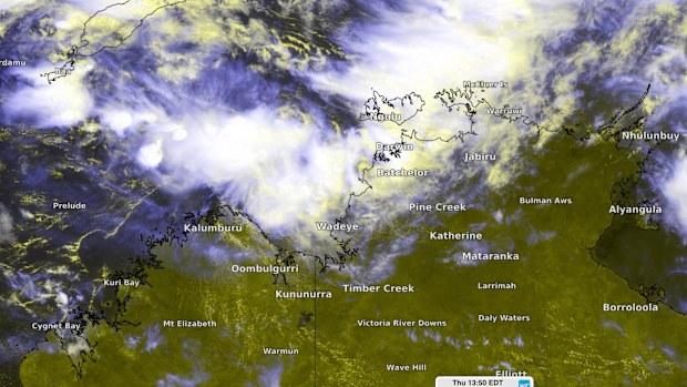 Enhanced visible/infrared satellite image showing cloud building around a developing tropical low to the west of Darwin on Thursday.
