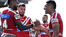 BRISBANE, AUSTRALIA - SEPTEMBER 07: Hamiso Tabuai-Fidow of the Dolphins celebrates with team mates after scoring a try during the round 27 NRL match between Dolphins and Canberra Raiders at Kayo Stadium, on September 07, 2025, in Brisbane, Australia. (Photo by Bradley Kanaris/Getty Images)