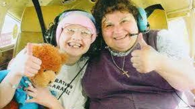Clauddine "Dee Dee" Blanchard (right) with daughter Gypsy Rose Blanchard in images shown in the HBO documentary 'Mommy Dead and Dearest'