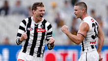 MELBOURNE, AUSTRALIA - JULY 27: Will Hoskin-Elliott (left) and Lachlan Sullivan of the Magpies celebrate during the 2025 AFL Round 20 match between the Richmond Tigers and the Collingwood Magpies at the Melbourne Cricket Ground on July 27, 2025 in Melbourne, Australia. (Photo by Michael Willson/AFL Photos via Getty Images)
