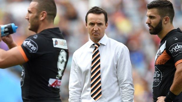 Jason Taylor (centre) and Robbie Farah (left) parted on unhappy terms at the Wests Tigers.
