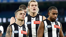 Darcy Moore looks dejected after the Magpies' loss to Geelong.
