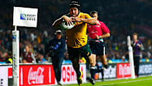 Matt Giteau scores a try against England during the 2015 Rugby World Cup.