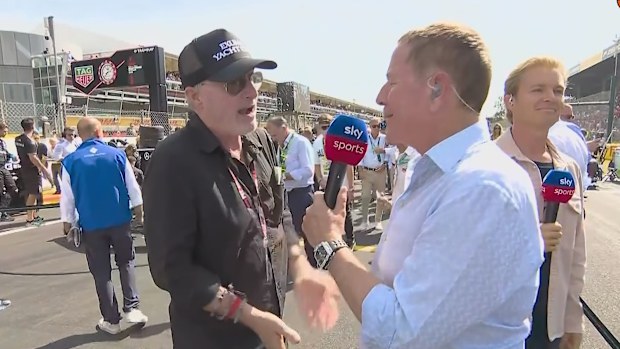 Martin Brundle and F1 world champion Nico Rosberg speak to former Ferrari driver Eddie Irvine. 