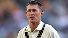 PERTH, AUSTRALIA - NOVEMBER 22: Marnus Labuschagne of Australia walks off the field after being dismissed by Mohammed Siraj of India for 2 runs during day one of the First Test match in the series between Australia and India at Perth Stadium on November 22, 2024 in Perth, Australia. (Photo by Cameron Spencer/Getty Images)