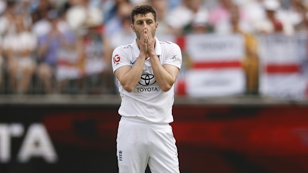 PERTH, AUSTRALIA - NOVEMBER 22: Mark Wood of England reacts during day two of the First 2025/26 Ashes Series Test Match between Australia and England at Perth Stadium on November 22, 2025 in Perth, Australia. (Photo by Darrian Traynor/Getty Images)
