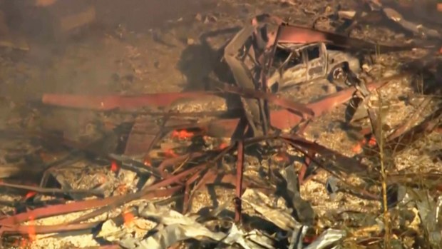 Debris covers the ground and vehicles after a powerful blast ripped through a military explosives manufacturing plant in Hickman County, Tennessee, on October 10.