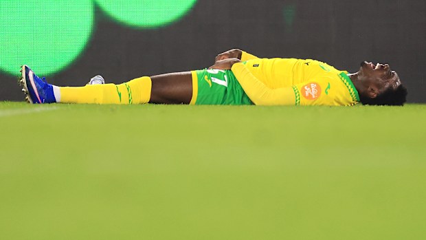 NORWICH, ENGLAND - FEBRUARY 25: Mohamed Toure of Norwich City lies on the floor prior to leaving the field injured during the Sky Bet Championship match between Norwich City and Sheffield Wednesday at Carrow Road on February 25, 2026 in Norwich, England. (Photo by Stephen Pond/Getty Images)