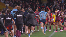 Cameron Murray runs from the bench to be involved in melee. 