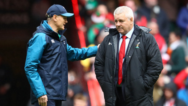 Joe Schmidt speaks with Warren Gatland prior to a Six Nations match.