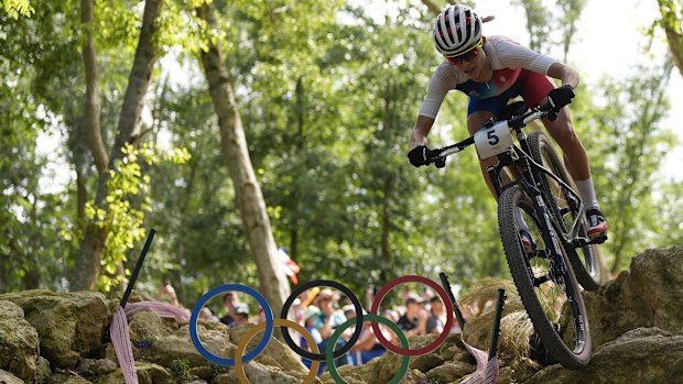 Loana Lecomte, of France, competes in the women's mountain bike cycling event