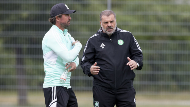 Celtic manager Ange Postecoglou with Harry Kewell during a Celtic training session.