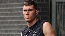 Mason Cox looks on during a Collingwood Magpies training session this year.
